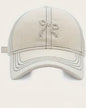 WHITE AND BLACK TRIM COQUETTE HAT